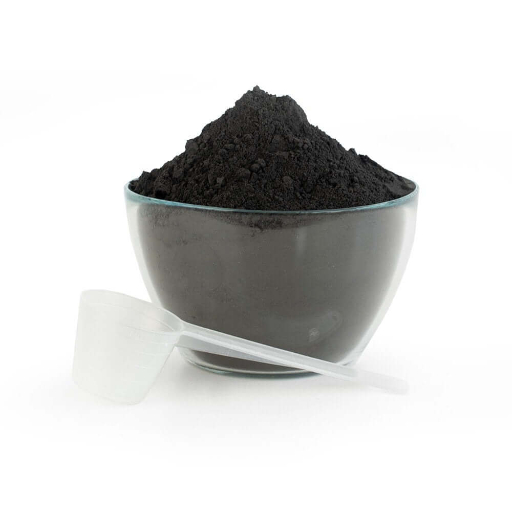 Gold Tree Organics digestive detox clay powder for horses in a grey ceramic bowl with measuring scoop